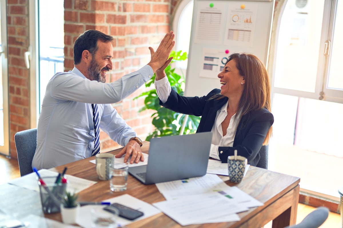 Professionals reviewing contracts